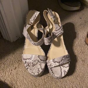 snakeskin platform heels